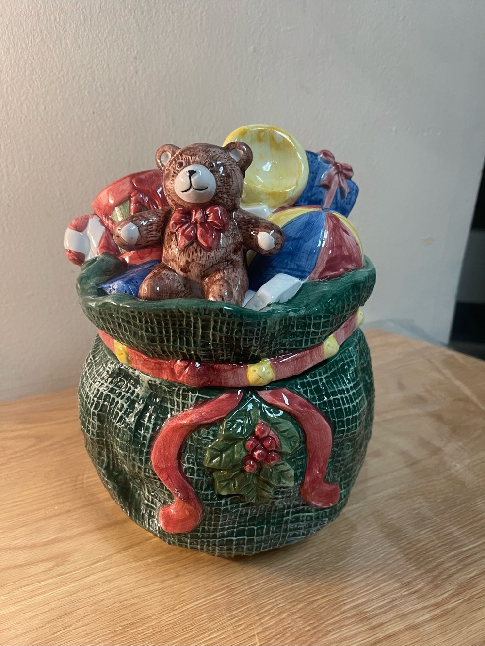 A vintage 1993 Santa’s Toy Bag Christmas cookie Jar from R.H. Macy & Company